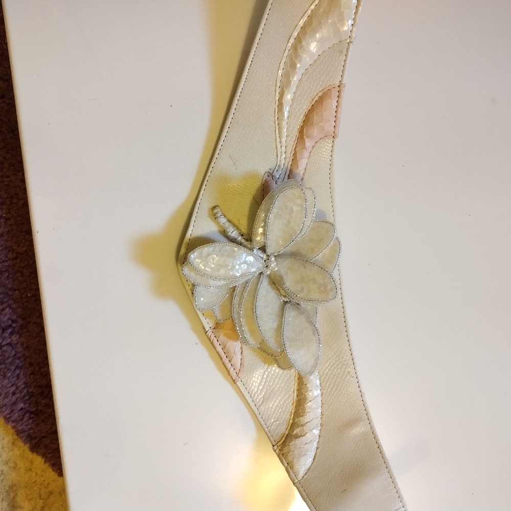 I THINK it's a Waldorf Creations, Vintage White Leather Wide Statement Belt